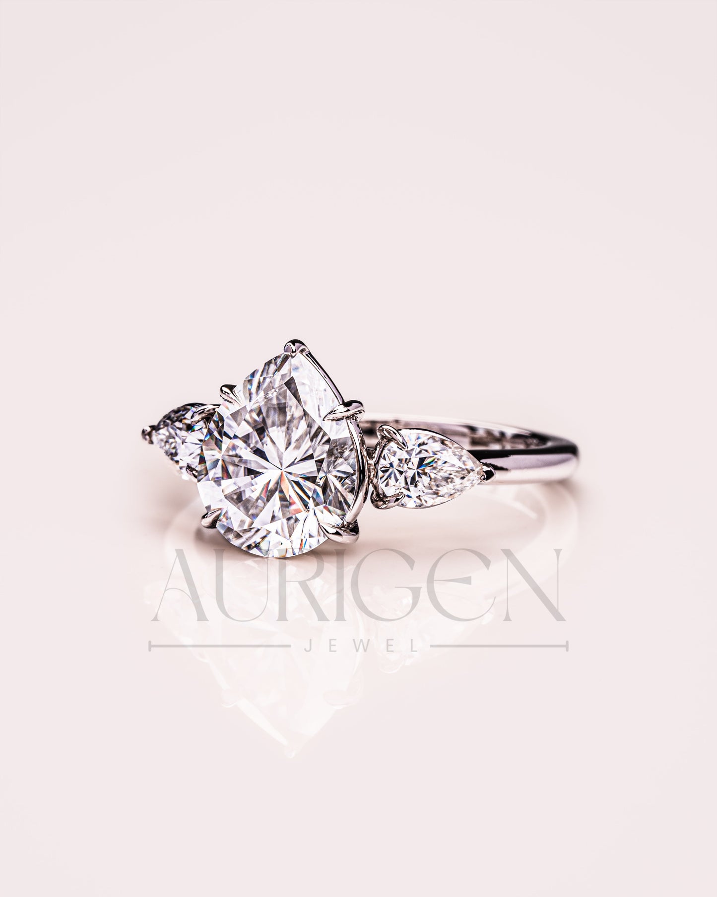 Brilliant Pear Cut Three-Stone Ring in 14k White Gold Moissanite and Lab Grown Diamond