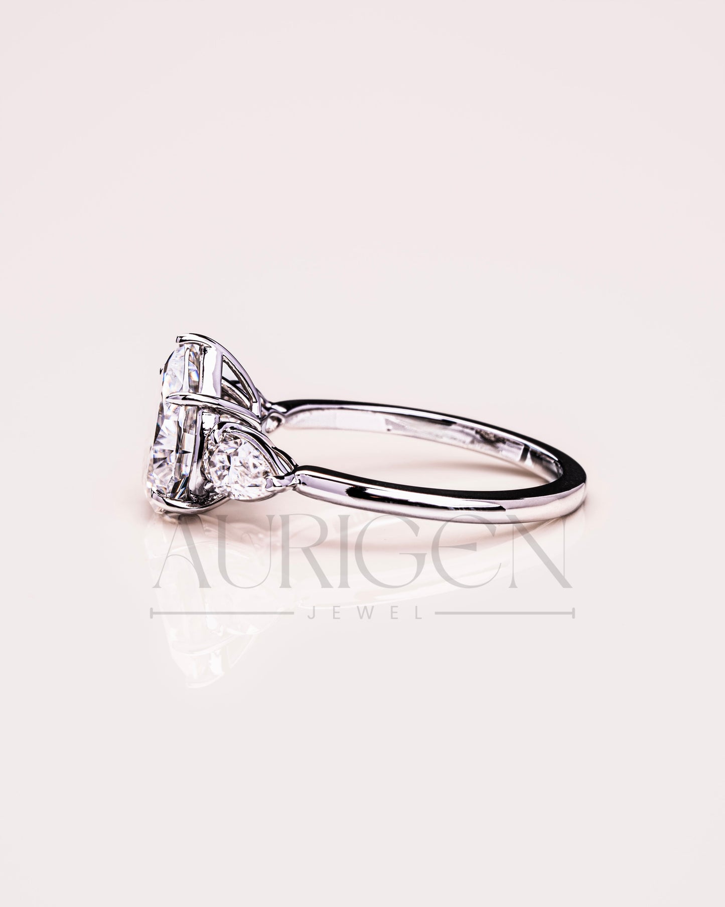 Brilliant Pear Cut Three-Stone Ring in 14k White Gold Moissanite and Lab Grown Diamond