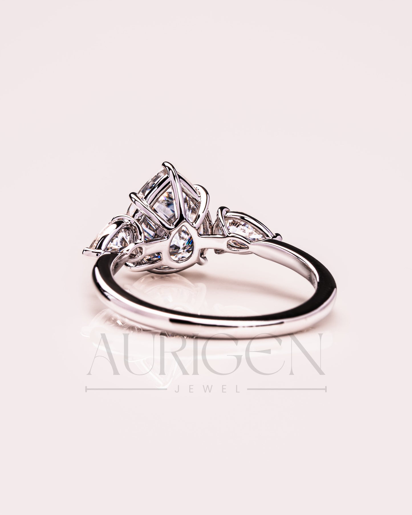 Brilliant Pear Cut Three-Stone Ring in 14k White Gold Moissanite and Lab Grown Diamond
