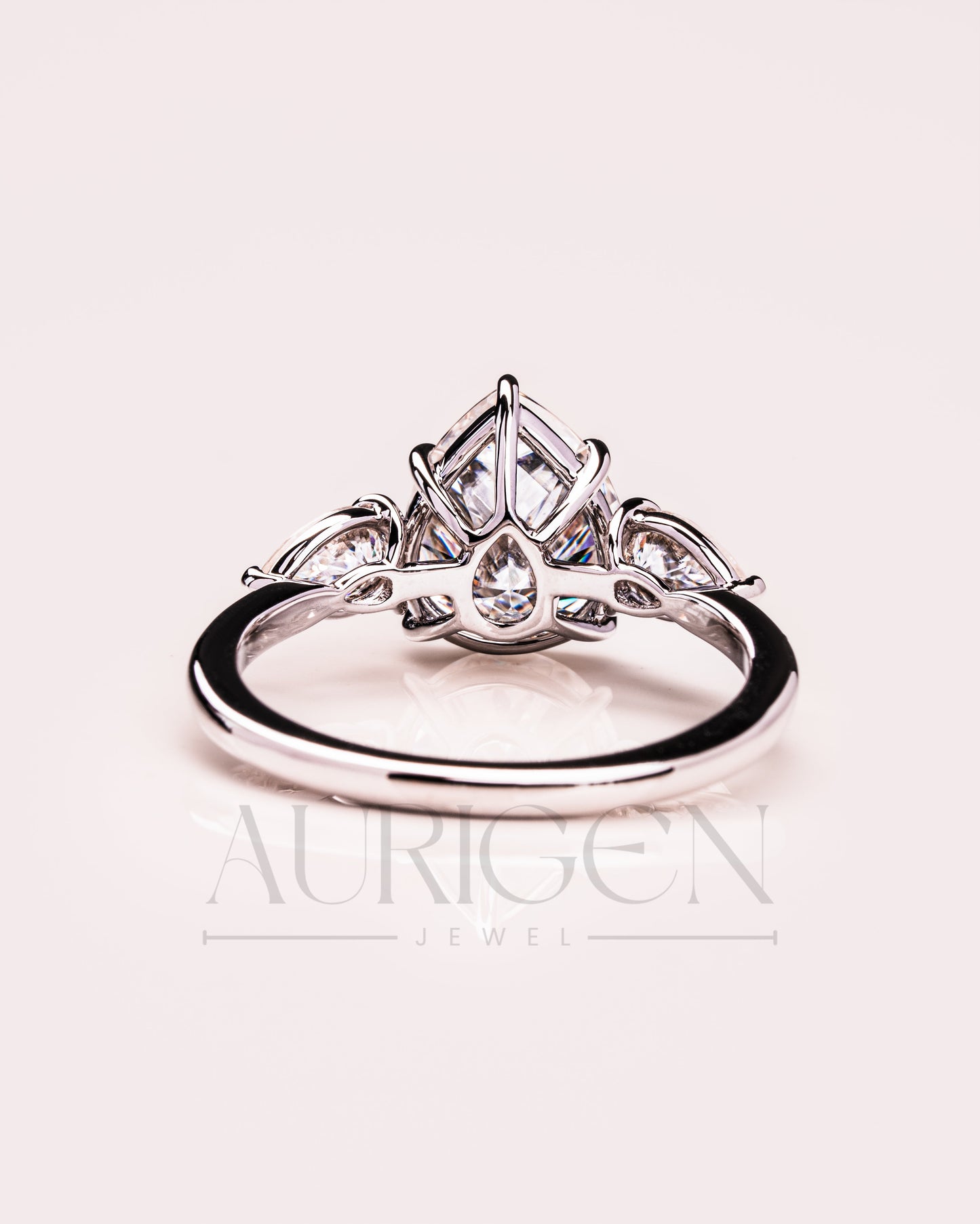 Brilliant Pear Cut Three-Stone Ring in 14k White Gold Moissanite and Lab Grown Diamond