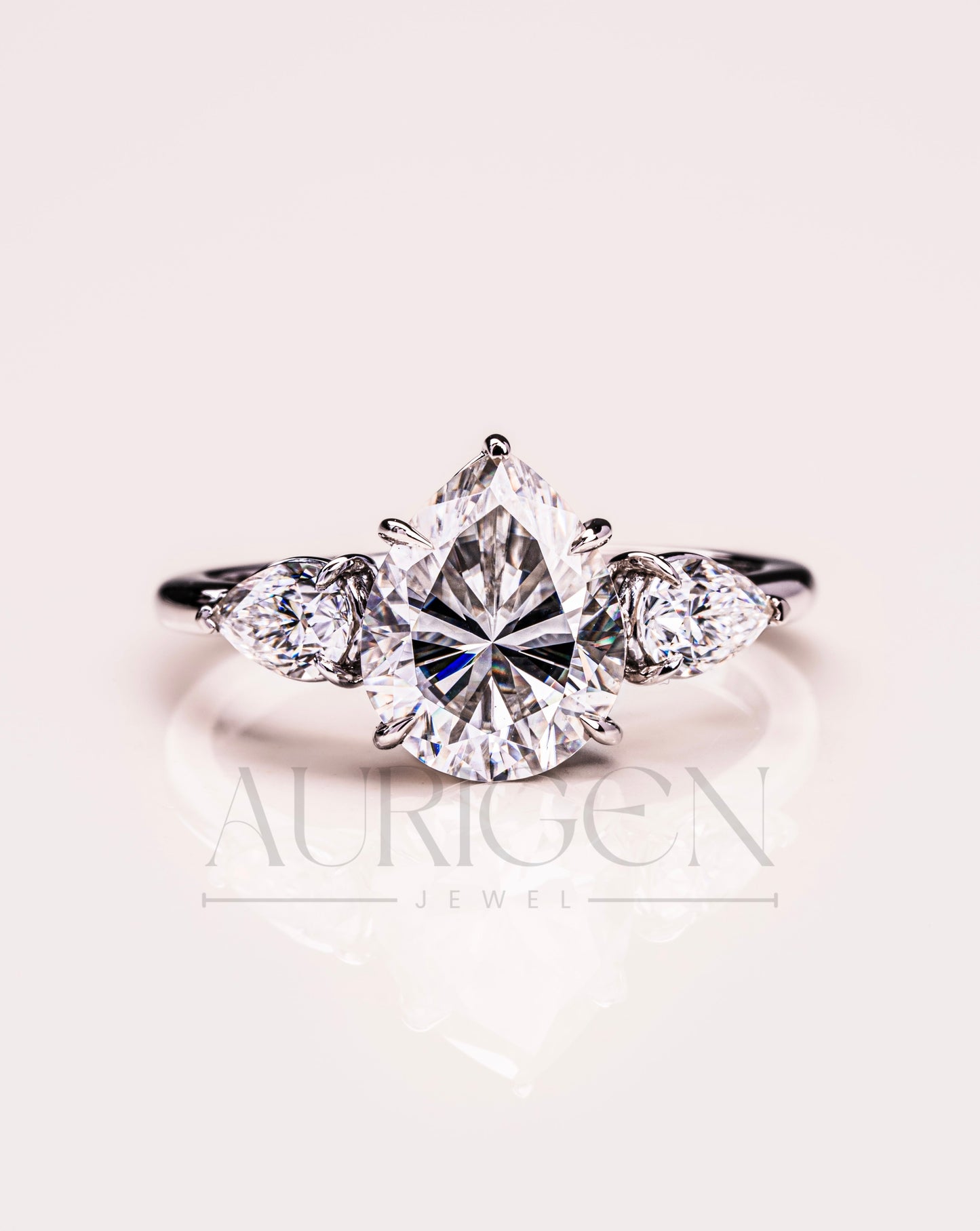 Brilliant Pear Cut Three-Stone Ring in 14k White Gold Moissanite and Lab Grown Diamond