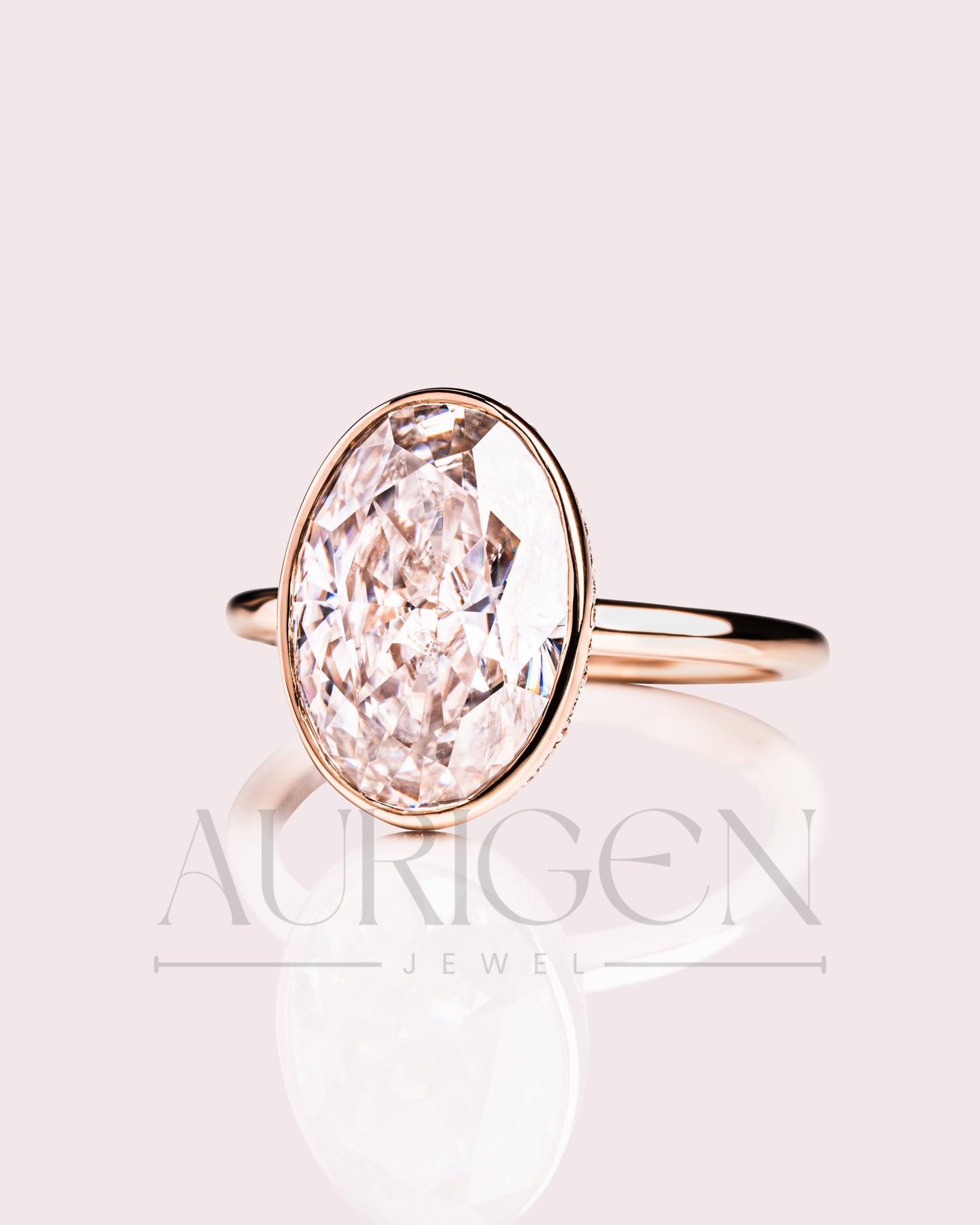 Modern Oval Cut Moissanite and Lab Grown Diamond Bezel Solitaire Ring in 14K Rose Gold