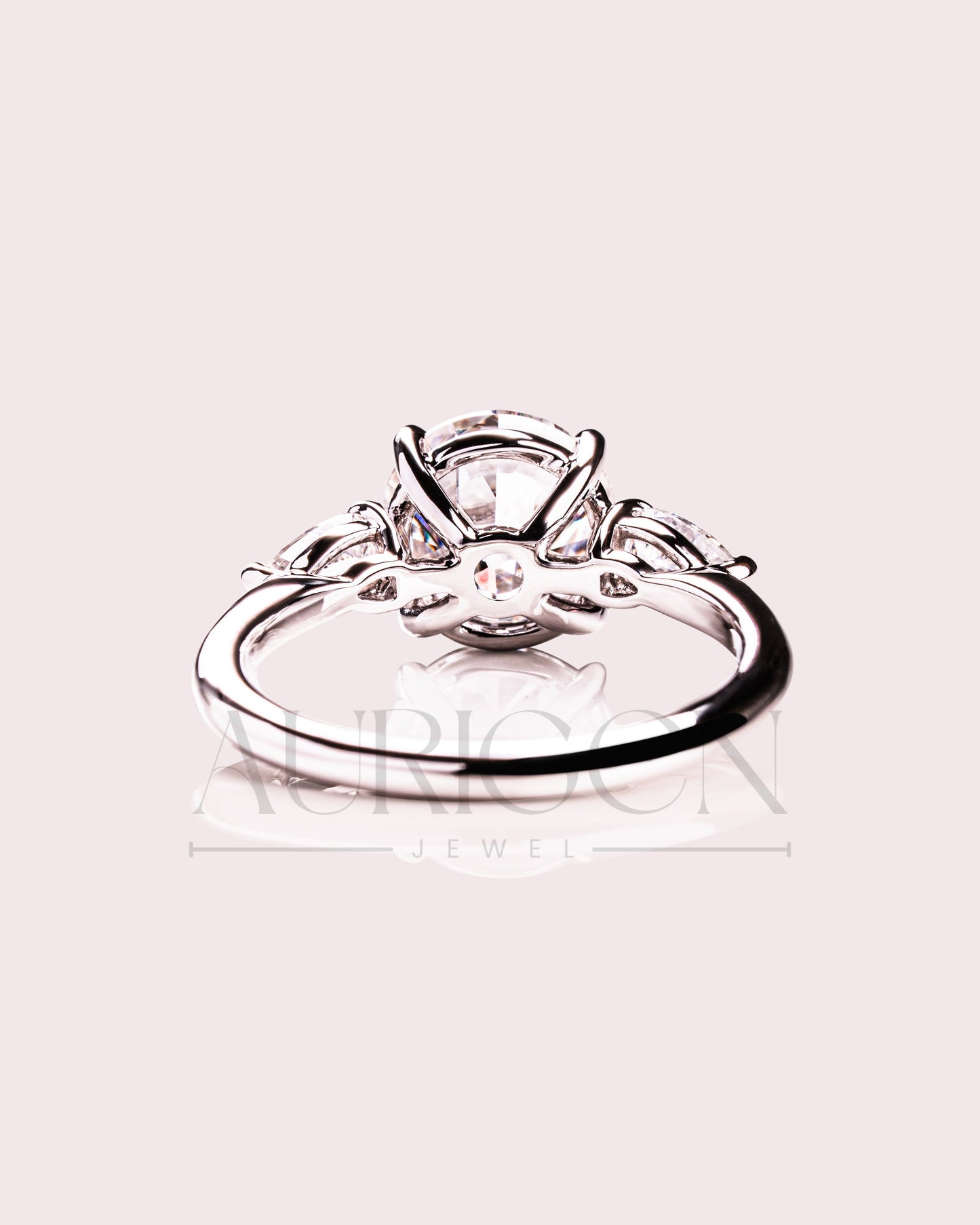 Round and Pear Cut Three Stone Engagement Ring - Moissanite and Lab Grown Diamond