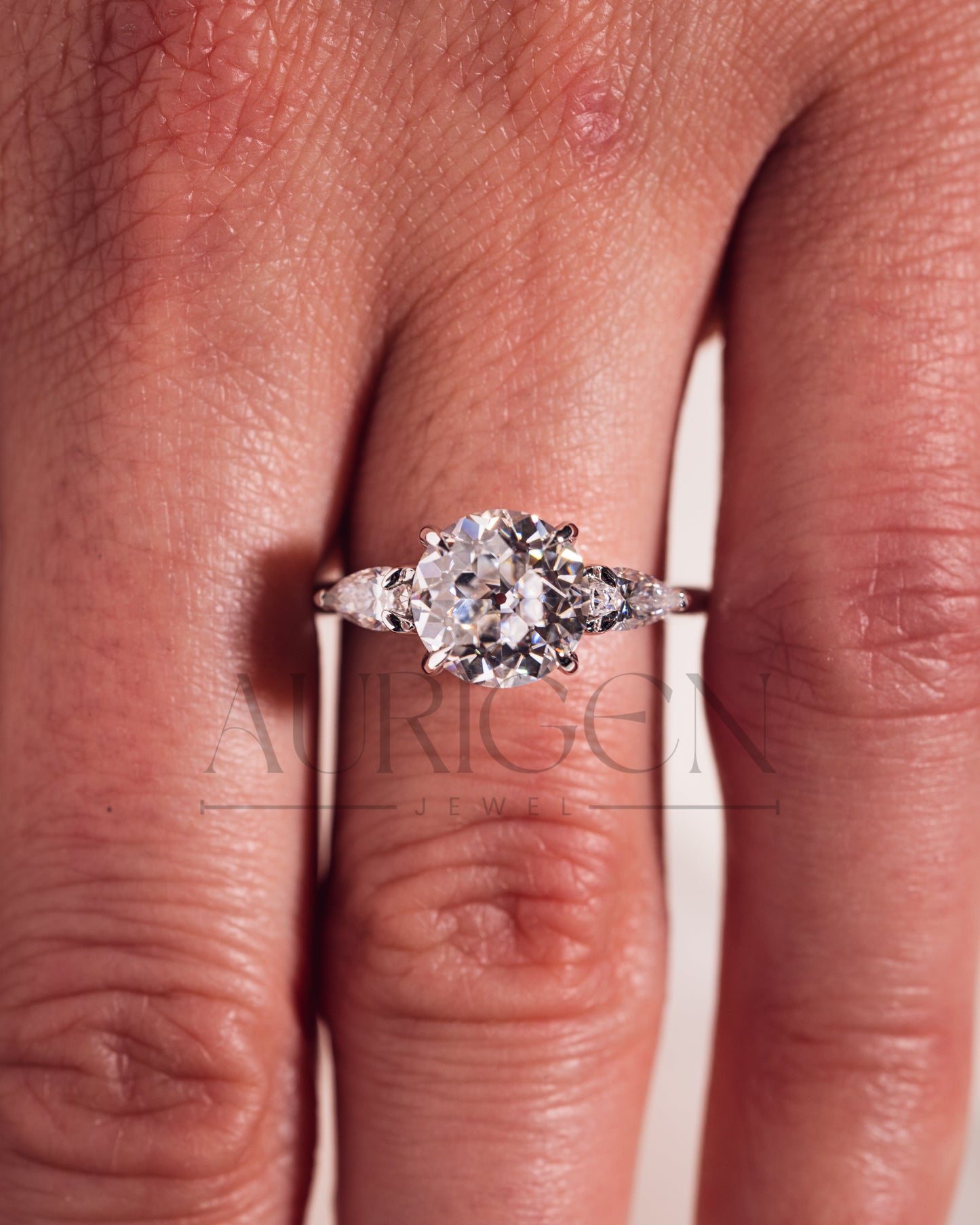 Round and Pear Cut Three Stone Engagement Ring - Moissanite and Lab Grown Diamond