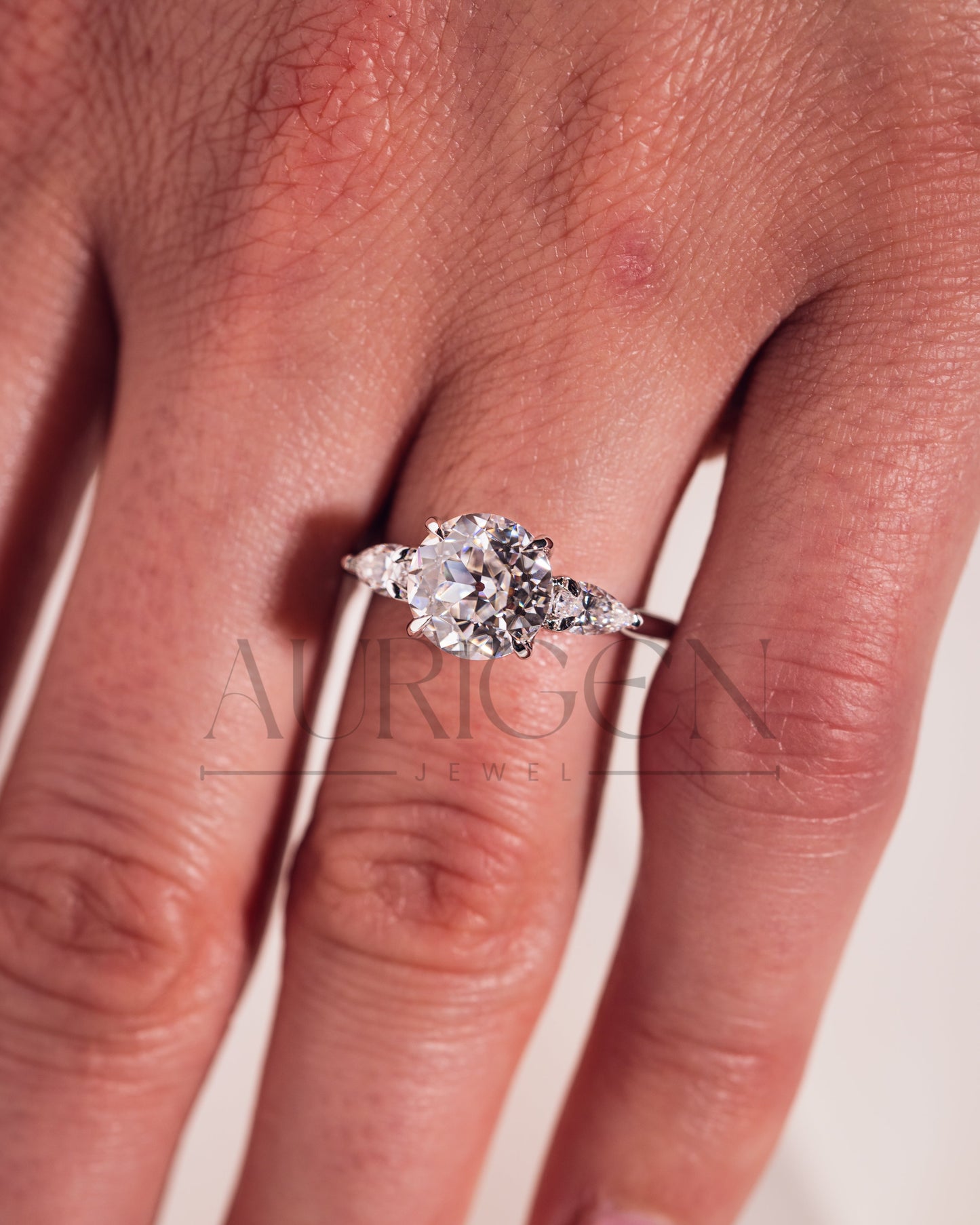 Round and Pear Cut Three Stone Engagement Ring - Moissanite and Lab Grown Diamond