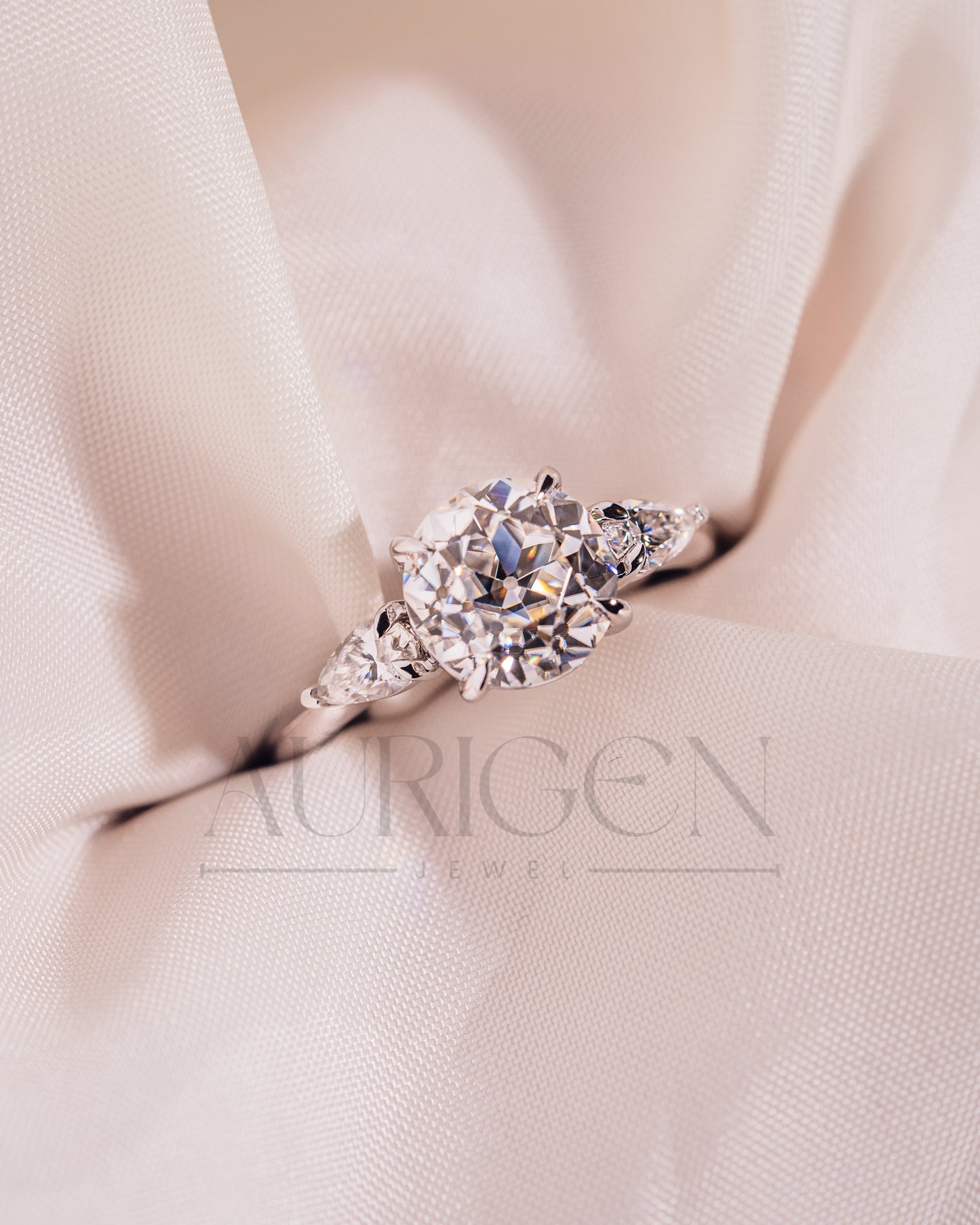 Round and Pear Cut Three Stone Engagement Ring - Moissanite and Lab Grown Diamond