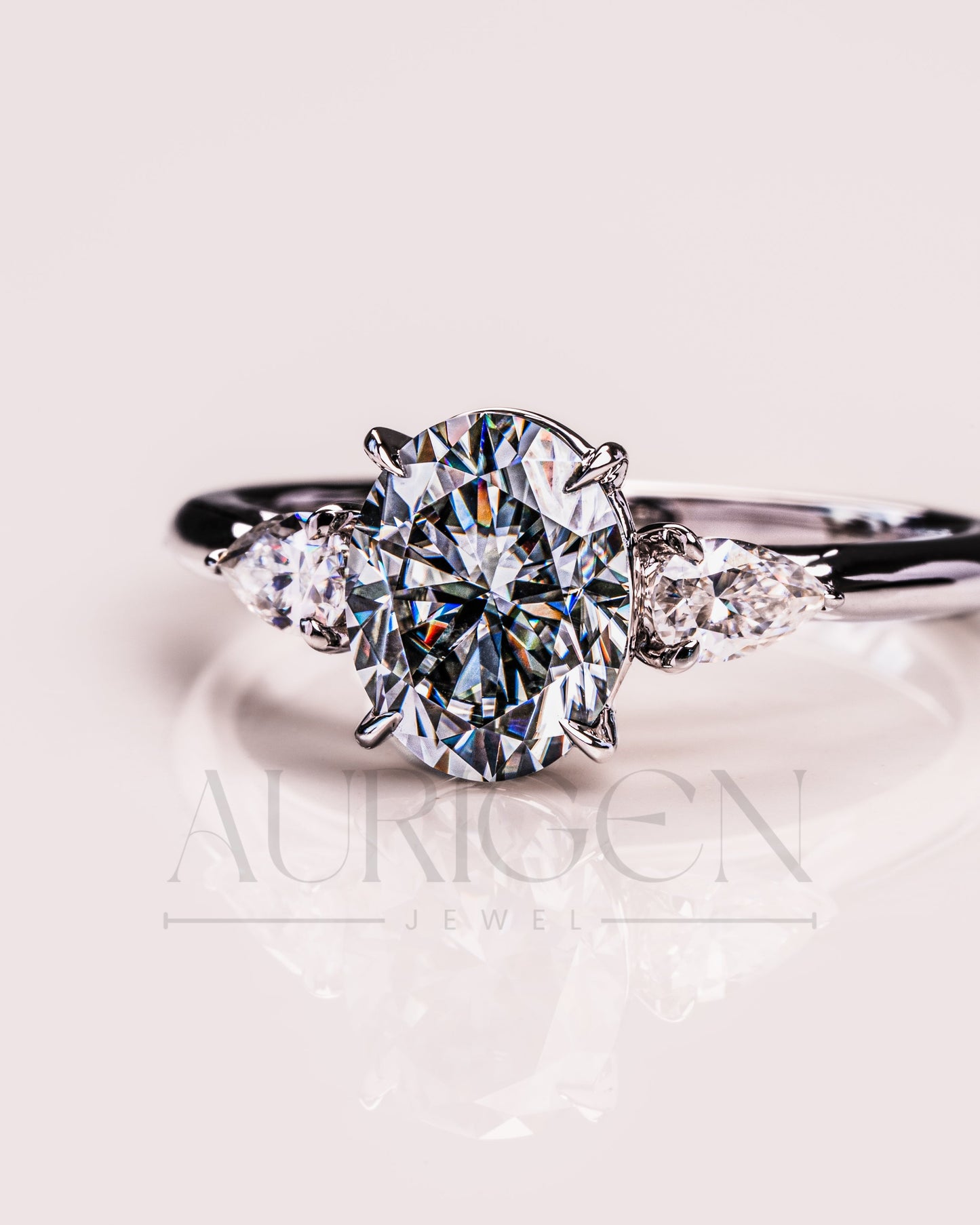 Oval & Pear Cut Moissanite and Leb Grown Three-Stone Ring in 14k White Gold