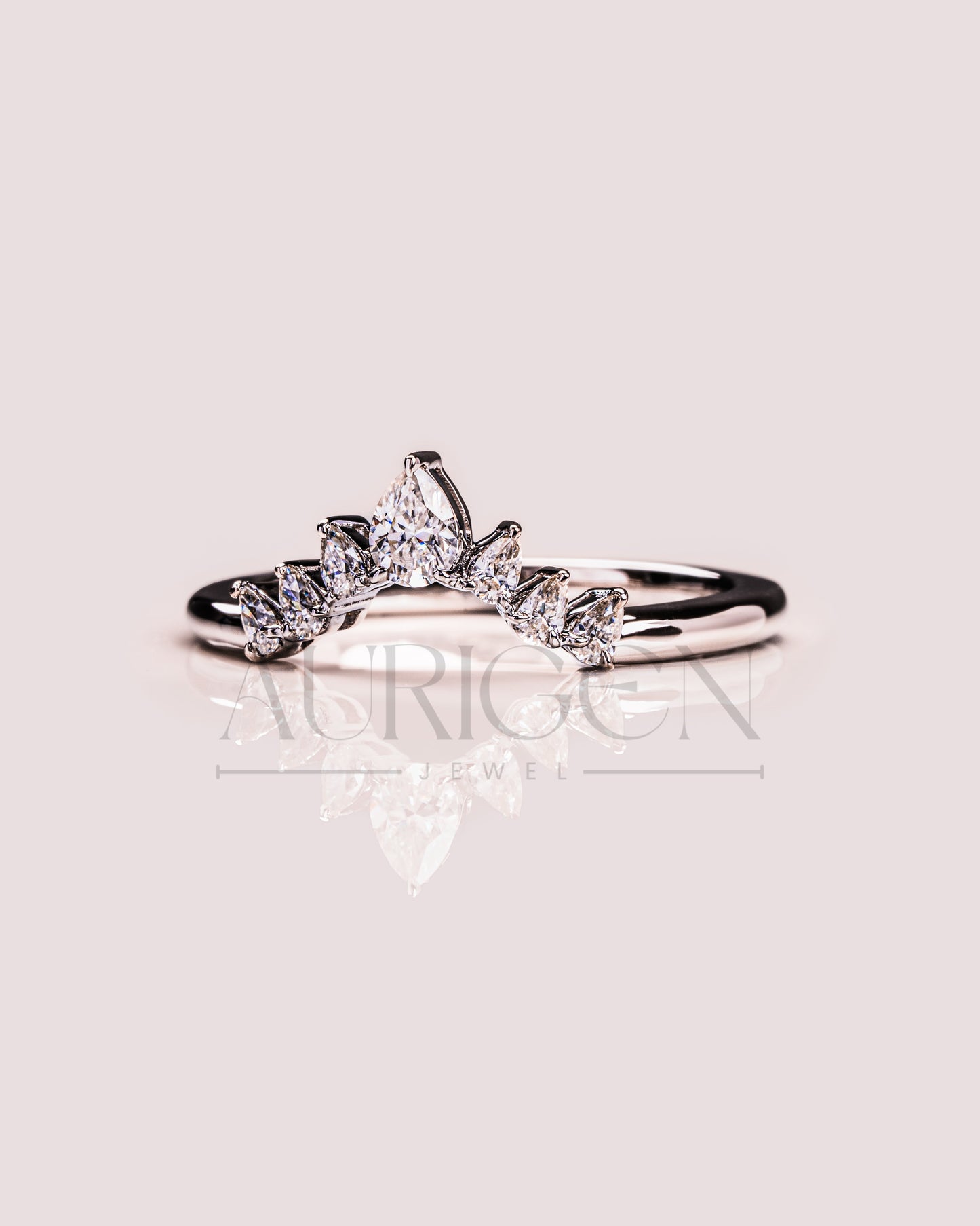 The Modern Pear Cut Moissanite and Lab Grown Diamond in 925 Sterling Silver