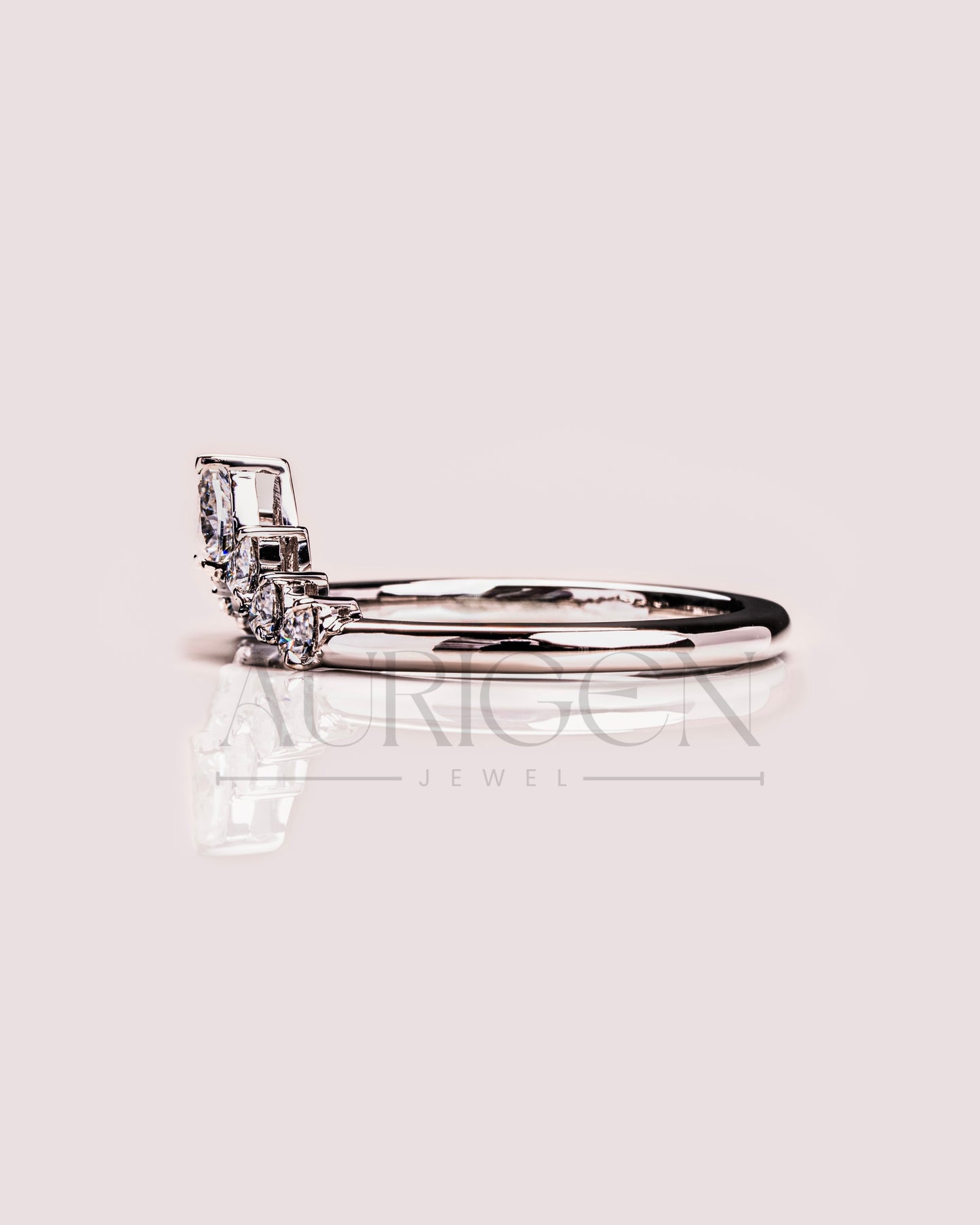 The Modern Pear Cut Moissanite and Lab Grown Diamond in 925 Sterling Silver