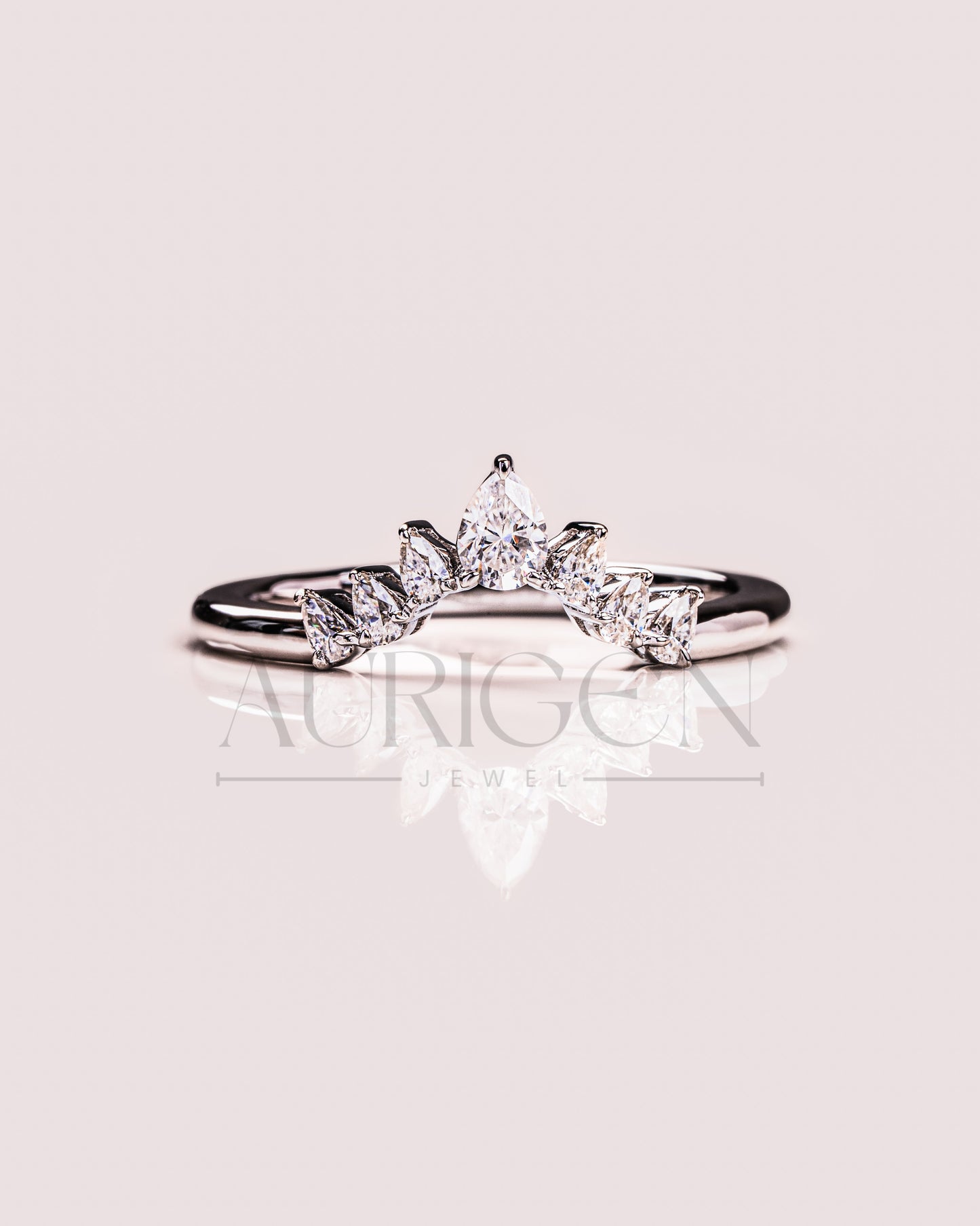 The Modern Pear Cut Moissanite and Lab Grown Diamond in 925 Sterling Silver