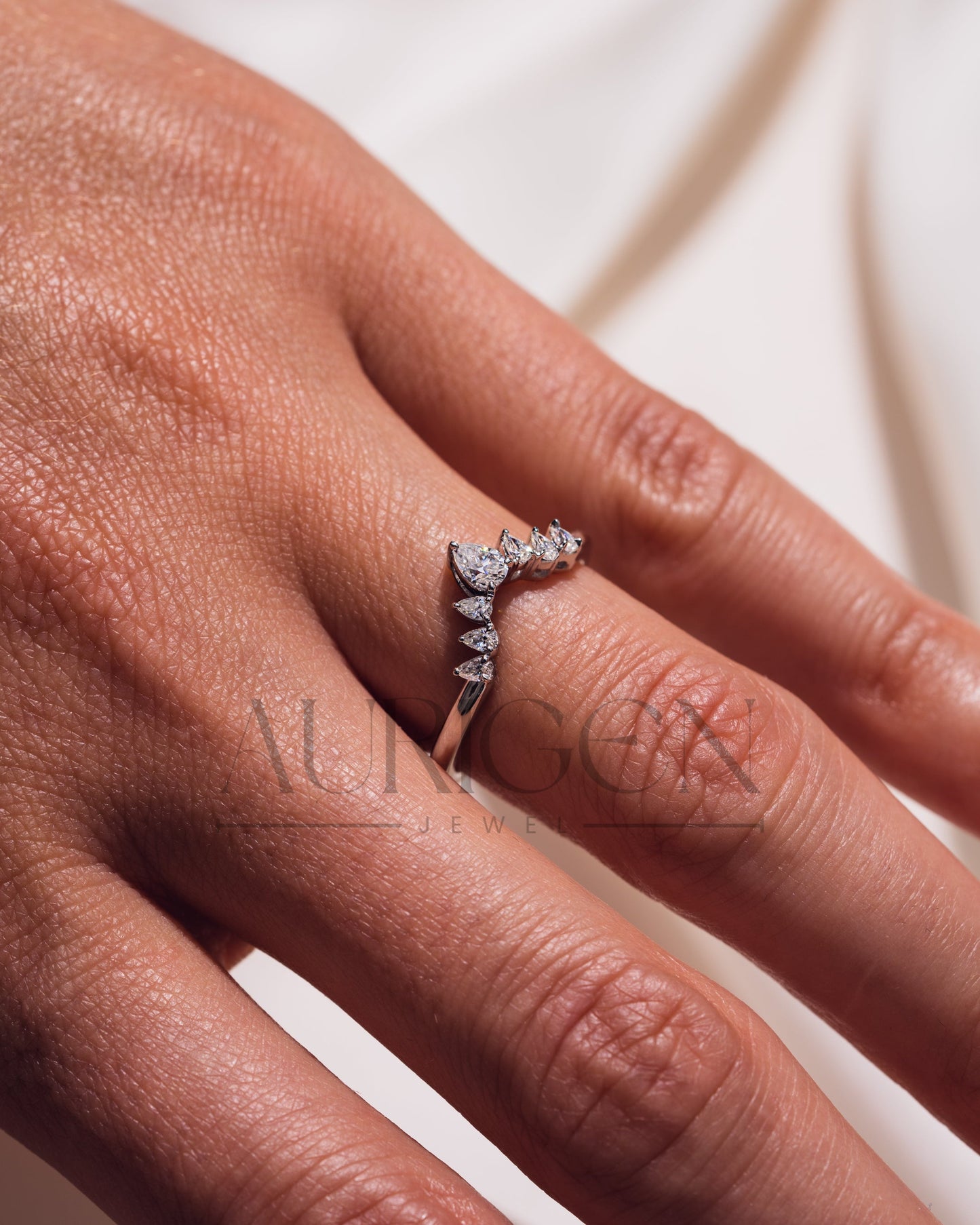 The Modern Pear Cut Moissanite and Lab Grown Diamond in 925 Sterling Silver
