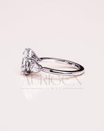 Brilliant Pear Cut Three-Stone Ring in 14k White Gold Moissanite and Lab Grown Diamond