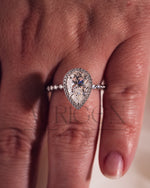 Brilliant Pear Cut Moissanite and Lab Grown Diamond Ring With Halo
