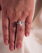 Brilliant Pear Cut Moissanite and Lab Grown Diamond Ring With Halo