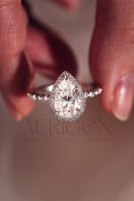 Brilliant Pear Cut Moissanite and Lab Grown Diamond Ring With Halo