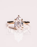 Crushed Ice Pear Moissanite and Lab Grown Diamond Solitaire Engagement Ring