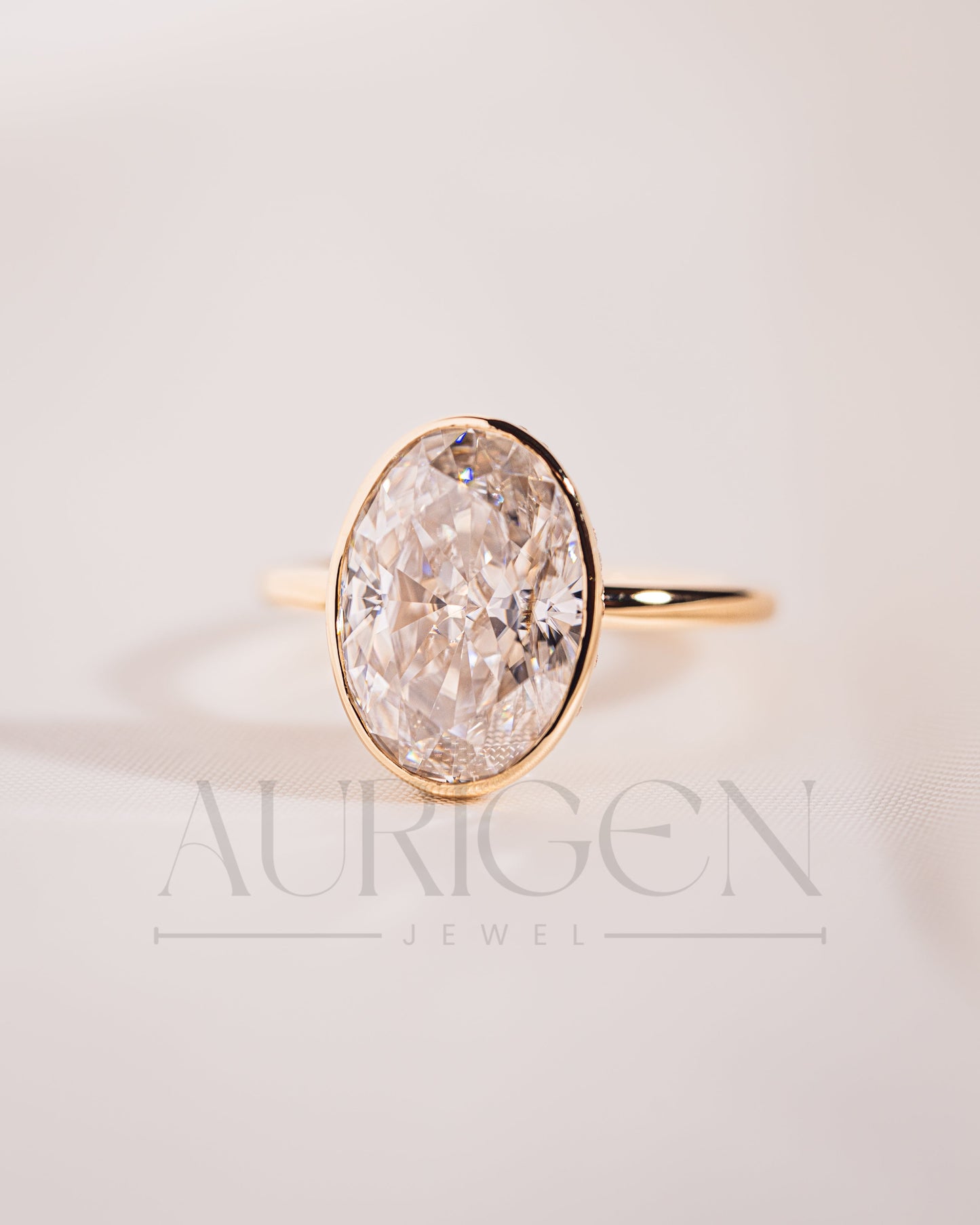 Modern Oval Cut Moissanite and Lab Grown Diamond Bezel Solitaire Ring in 14K Rose Gold