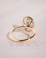 Modern Oval Cut Moissanite and Lab Grown Diamond Bezel Solitaire Ring in 14K Rose Gold