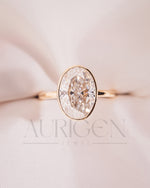 Modern Oval Cut Moissanite and Lab Grown Diamond Bezel Solitaire Ring in 14K Rose Gold