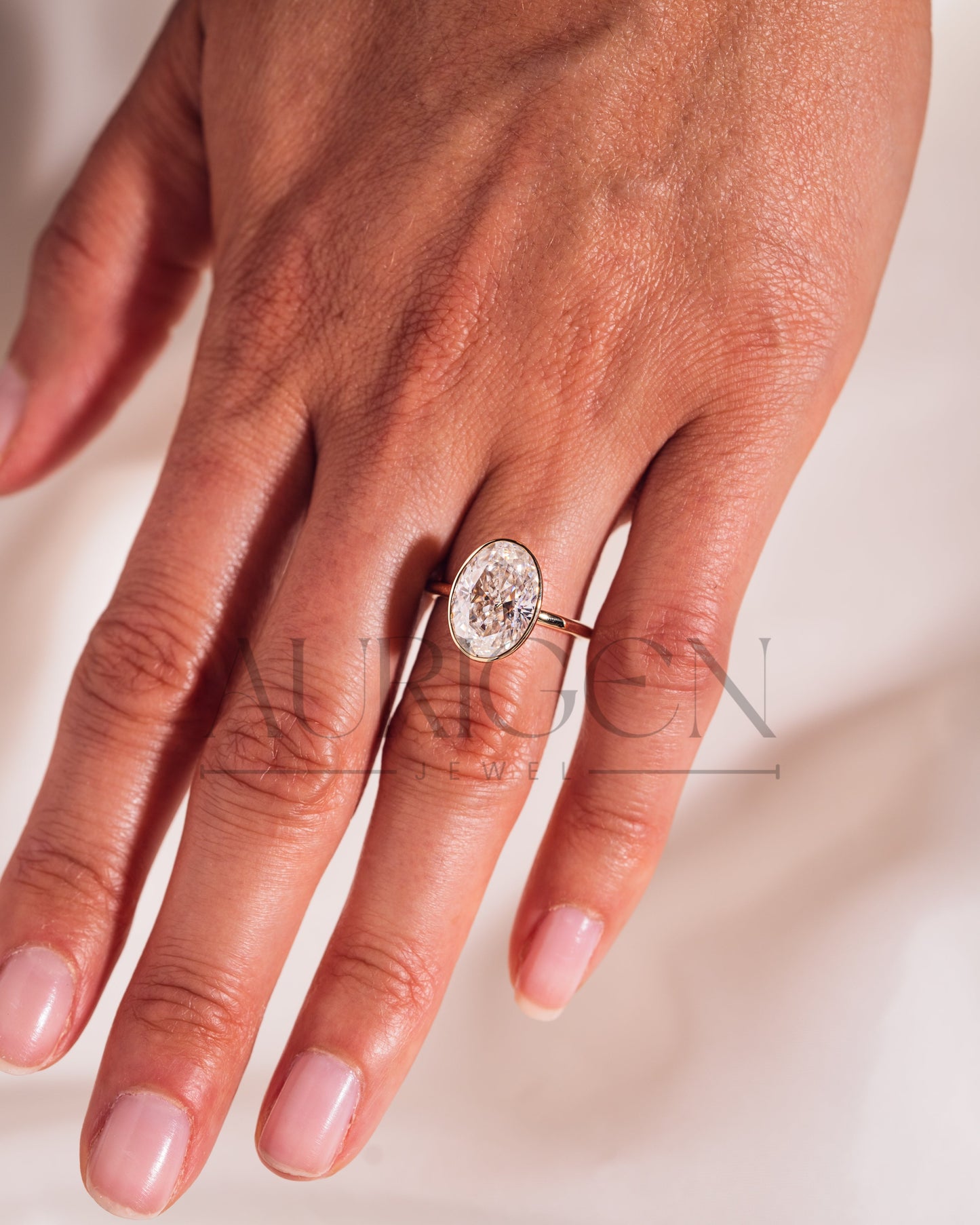 Modern Oval Cut Moissanite and Lab Grown Diamond Bezel Solitaire Ring in 14K Rose Gold