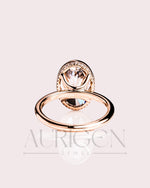 Modern Oval Cut Moissanite and Lab Grown Diamond Bezel Solitaire Ring in 14K Rose Gold