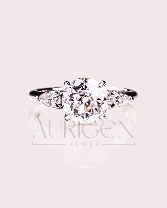 Round and Pear Cut Three Stone Engagement Ring - Moissanite and Lab Grown Diamond