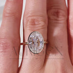 Modern Oval Cut Moissanite and Lab Grown Diamond Bezel Solitaire Ring in 14K Rose Gold