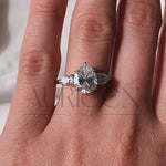 Brilliant Pear Cut Three-Stone Ring in 14k White Gold Moissanite and Lab Grown Diamond